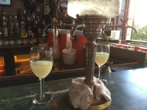 Louching Lucid Absinthe with the absinthe fountain at Pirates Alley Cafe in New Orleans' French Quarter