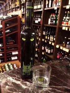 A bottle of Lucid Absinthe with a gift glass